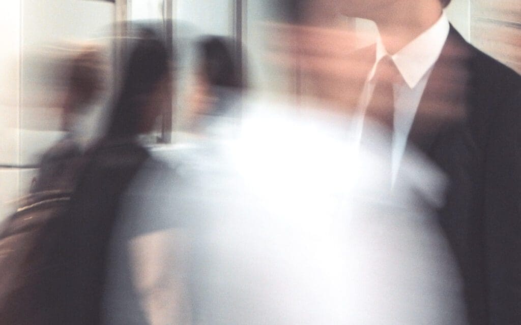 people running around an office