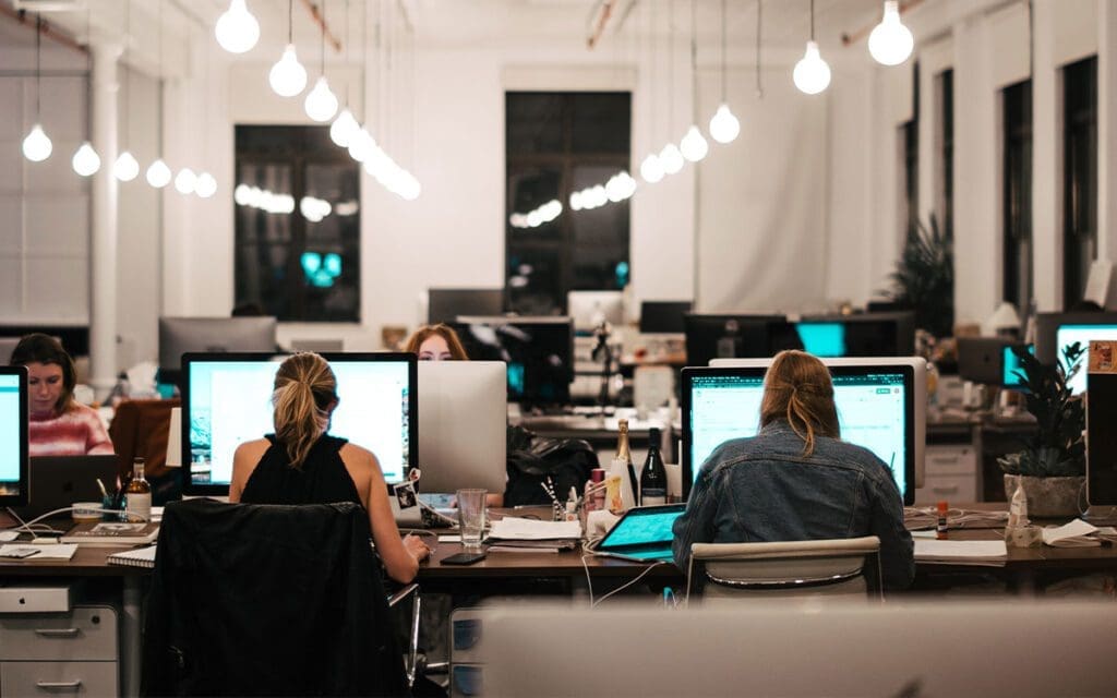 People in an office - illustrating underwriters working in an business rules engine